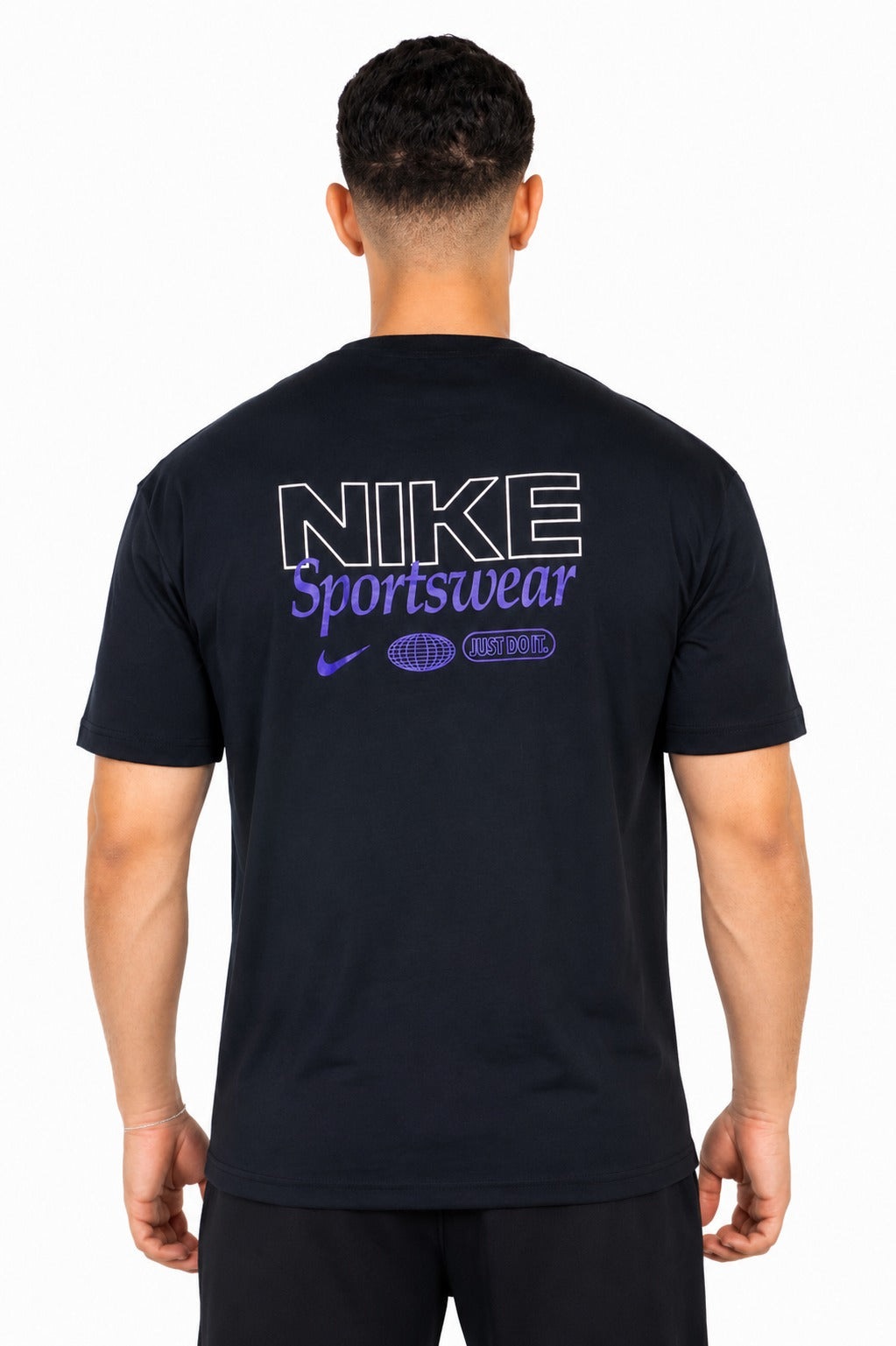 A man wearing a black Nike t-shirt