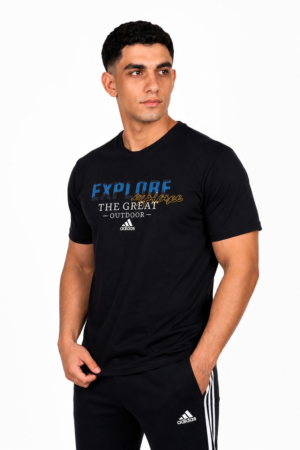A man wearing a black Adidas t-shirt