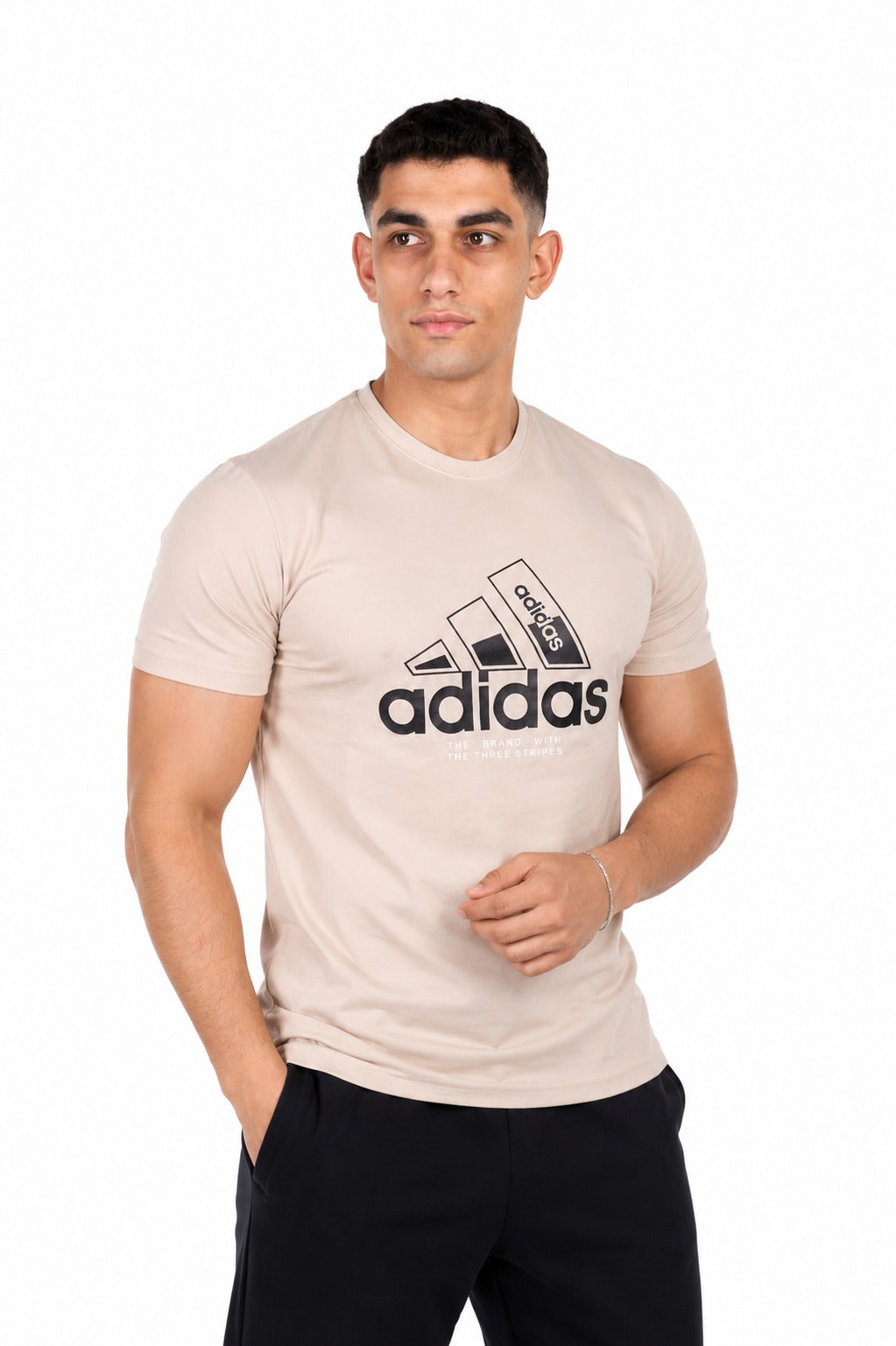 A man wearing a Light Beige Adidas t-shirt