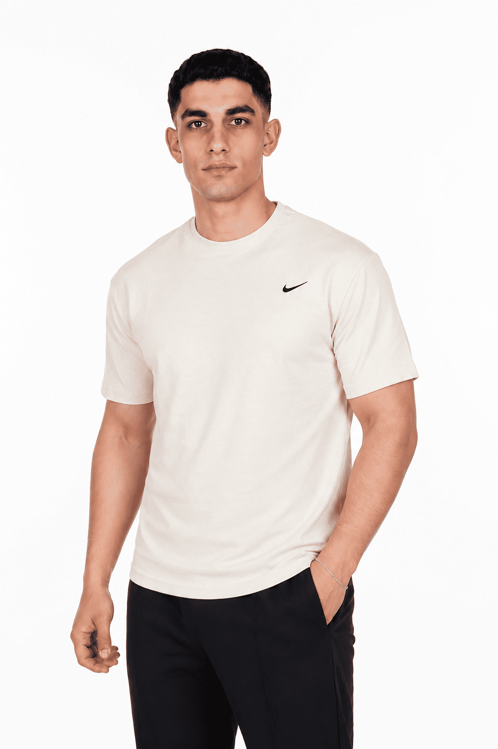 Man wearing a white Nike t-shirt on a white background