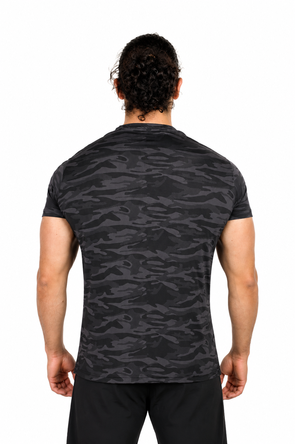 Person wearing a black camouflage t-shirt on a background