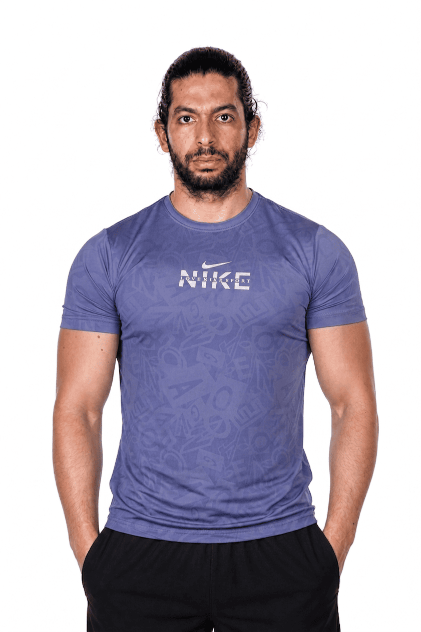 Man wearing a purple Nike t-shirt on a white background