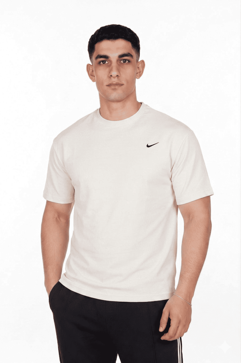 Man wearing a white Nike t-shirt on a white background