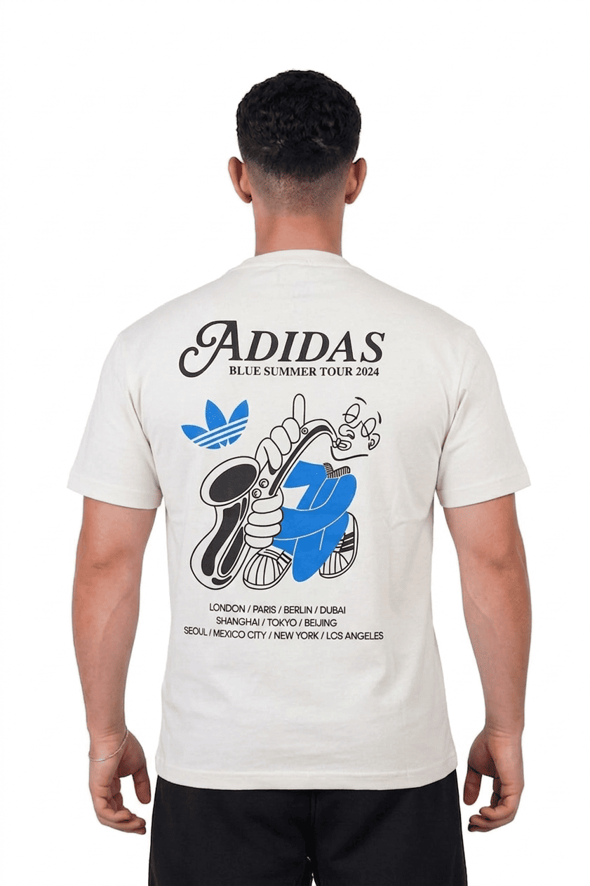 Person wearing a white Adidas t-shirt with a graphic design on the back