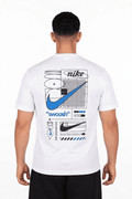 Person wearing a white t-shirt with Nike branding and graphics on the back.
