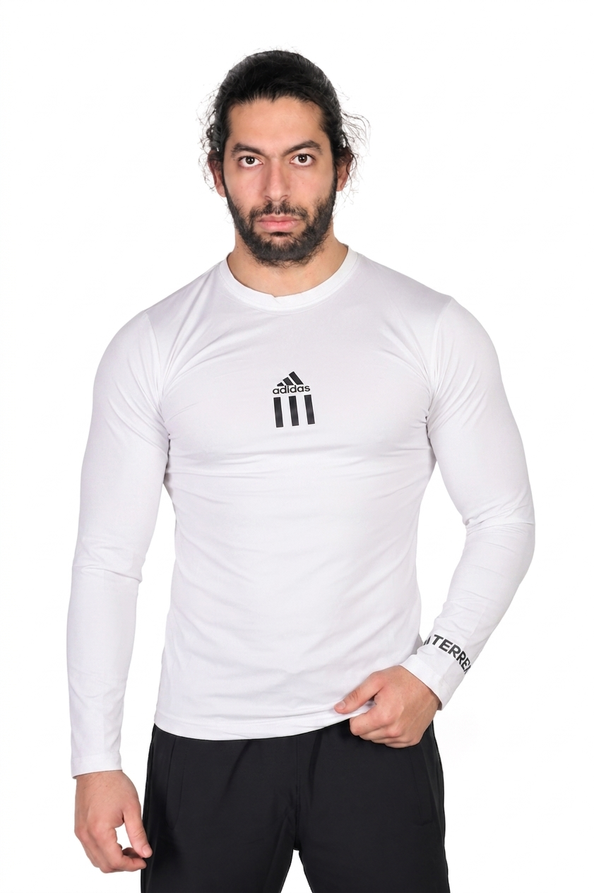 Man wearing a white long-sleeve athletic shirt with Adidas logo on a white background
