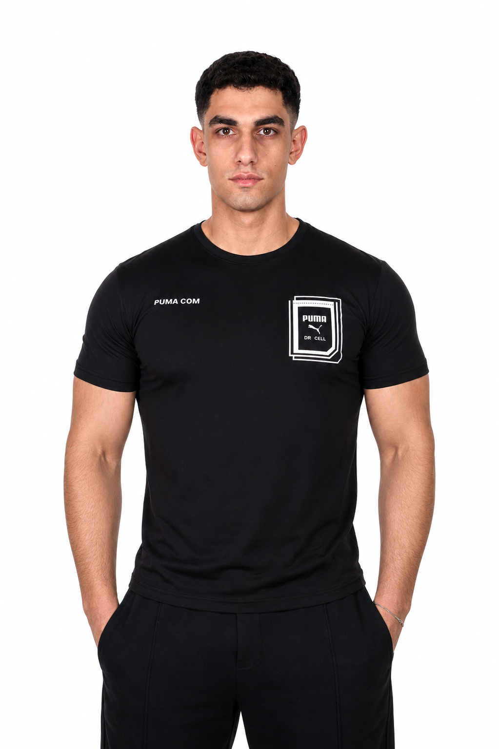 Man wearing a black t-shirt with Puma branding on a white background