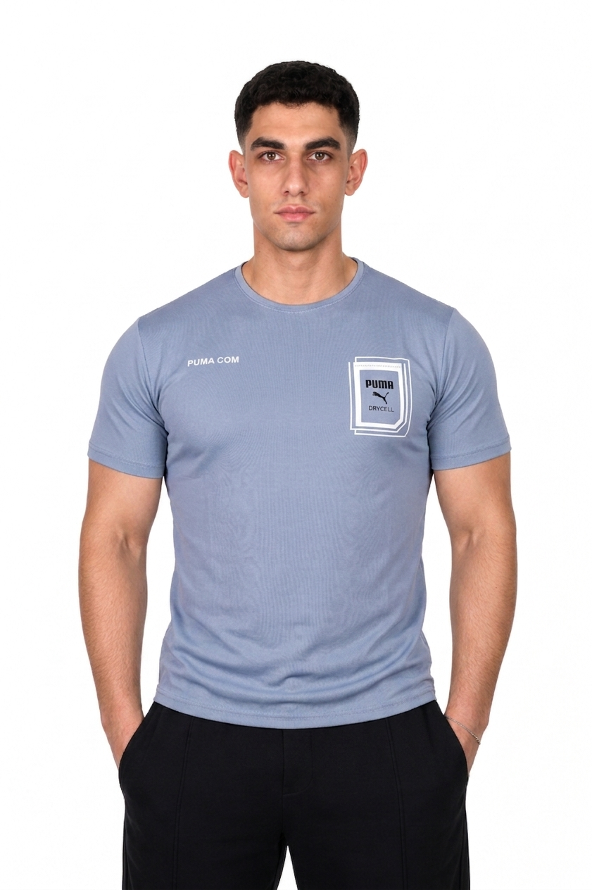 Man wearing a light blue t-shirt with a logo on a white background